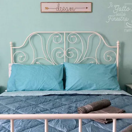 Il Gatto Sulla Finestra *